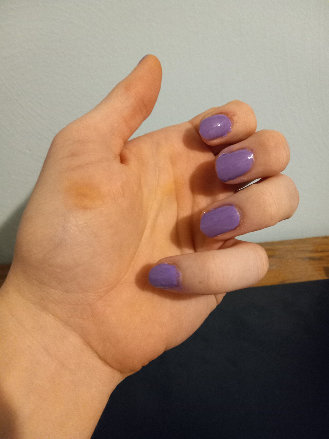 A photo of my nails. They're painted purple